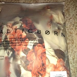 Baltic Born long-sleeved ivory dress with fall colored floral print